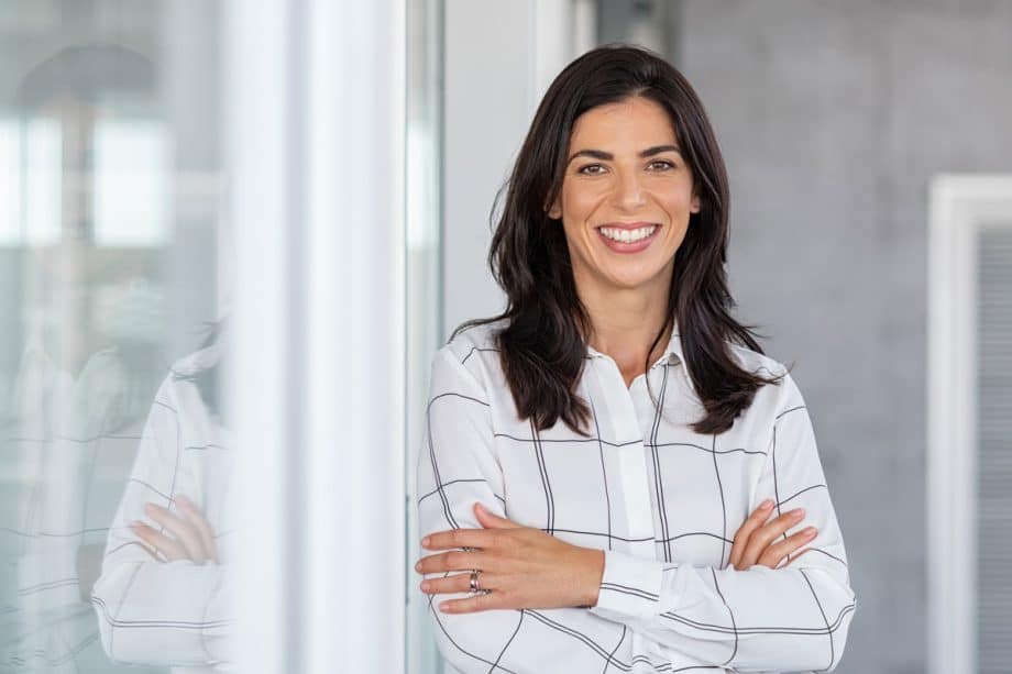 dark haired woman smiling